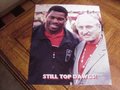 Picture: Herschel Walker and Vince Dooley of the Georgia Bulldogs at a 1980 National Championship Team Reunion "Still Top Dawgs" 11 X 14 photo.