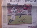 Picture: We only have one original "The Atlanta Journal-Constitution" sports section from November 16, 2003 hand-signed by Michael Johnson of the Georgia Bulldogs on the color photo of his catch vs. Auburn in a win. The autograph is absolutely guaranteed authentic and comes with a Certificate of Authenticity from us.