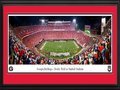 Picture: This is the first ever officially licensed stadium print of Vince Dooley Field at Sanford Stadium. This is a 13.5 X 40 panorama of the Georgia Bulldogs 23-17 win against Notre Dame on September 21, 2019 that is professionally double matted in Bulldogs team colors and framed to 18 X 44 and ready to hang on your wall. This shows the Georgia football team during their much-anticipated matchup with the Notre Dame Fighting Irish on Dooley Field at Sanford Stadium. Named for the late Dr. Steadman V. Sanford, a former University president, the stadium was built in 1929 for $360,000. As of 2019, it is the eighth largest on-campus stadium in the nation with a capacity of 92,746. It has long been one of the country's most magnificent and exhilarating venues for college football, nationally ranking among the top ten in attendance. A favorite Georgia victory tradition is the "ringing of the chapel bell." The university, founded in 1785 in Athens, GA, educates over 38,200 students. Show your team spirit with a Panorama game-day print. The state-of-the-art cameras capture amazing high definition photos from carefully researched vantage points inside the stadiums and arenas that are so clear and life-like, you'll feel like you were there. These officially licensed, Made in the USA, large panoramic prints proclaim your allegiance to your team while creating a focal point in the home, office or fan cave. They also make the perfect gift for the sports fan in your life.