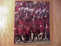Picture: Georgia Bulldogs original 8 X 10 photo of players with Silver and Red Helmets used once in team history. This is an original photo exclusive to Georgia Bulldogs Prints.