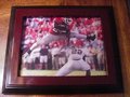 Picture: Knowshon Moreno of the Georgia Bulldogs "The Leap" over Central Michigan original 8 X 10 photo framed to 11 X 14. He jumped so high some of his helmet is out of the shot! Ready to hang on your wall as is!