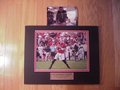 Picture: Aaron Murray Georgia Bulldogs hand-signed 8 X 10 photo from the South Carolina win professionally double matted in team colors to 11 X 14 with a plate that reads "Not So Superior Anymore, Georgia Bulldogs 41, South Carolina 30.". Aaron signed these photos Saturday December 14, 2013. The autograph is guaranteed authentic and will not only come with a Certificate of Authenticity but a picture of Aaron actually signing it.