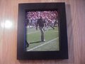 Picture: Kirby Smart leads the Georgia Bulldogs original and high quality 8 X 10 photo professionally framed in very nice black wood to 11 X 14.