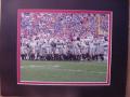 Picture: Georgia Bulldogs original 8 X 10 "Celebration" photo professionally double matted in team colors to 11 X 14 so that it fits a standard frame. Those who can be seen in this photo include Tripp Chandler, C.J. Byrd, Kaleb King, Mikey Henderson, Kelin Johnson, Demiko Goodman,  Jeff Henson and others.