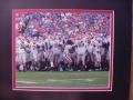 Picture: Georgia Bulldogs "Celebration" original 8 X 10 photo professionally double matted in team colors to 11 X 14 so that it fits a standard frame. Those who can be seen in this photo include Matthew Stafford,  Brandon Coutu, Joe Cox, Kade Weston, and others. 