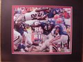 Picture: Knowhson Moreno hand-signed Georgia Bulldogs 8 X 10 photo of his leaping touchdown against Florida that led to the celebration professionally double matted to 11 X 14 so that it fits a standard frame. The autograph is absolutely guaranteed authentic and comes with a Certificate of Authenticity from GeorgiaBulldogsPrints.com.