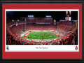 Picture: Ohio State Buckeyes 13.5 X 40 Panoramic Poster professionally double matted in team colors and framed to 18 X 44.The panoramic photo, taken on September 3, 2022, after the Buckeyes defeated the Notre Dame Fighting Irish 21-10, captured the tradition of Ohio State football players locking arms and standing together with the cheerleaders and football staff to sing "Carmen Ohio" in front of the marching band. This decades old song unites all Buckeyes, past and present. Affectionately known as the "Shoe", Ohio Stadium celebrates its centennial season in 2022 and is one of the most recognizable landmarks in all of sports. Since the opening game against Ohio Wesleyan on, October 7, 1922, more than 36 million fans have streamed through the stadium’s gates. With a seating capacity of 102,780, Ohio Stadium is one of the largest stadiums in the world, the fourth largest on-campus facility in the nation and is listed in the National Register of Historic Places.