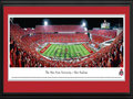 Picture: Ohio State Buckeyes Ohio Stadium 13.5 X 40 panoramic print professionally double matted in team colors and framed to 18 X 44. This panorama of Ohio Stadium showcases The Ohio State University Marching Band performing “Script Ohio,” moments before The Ohio State Buckeyes® played to victory over the Wisconsin Badgers. Of all the traditions in Ohio State’s great football history, the most widely recognized and greatest spectacle in college sports is the Script Ohio, the formation performed by the band each and every game day. In addition, the tradition of dotting the “I” dates back to 1936 and was invented by a sousaphone player. To this day, only sousaphone players with a minimum of 4 years membership are allowed to dot the I.